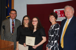 Zoe Klein (center) is congratulated by (from left) Board President Peter Wunsch, Teacher Coordinator Stacey Governa, Executive Director Teresa Strum and COO Michael Flynn.